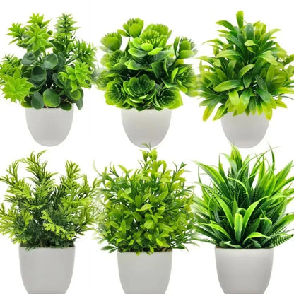 Planta artificial en maceta blanca