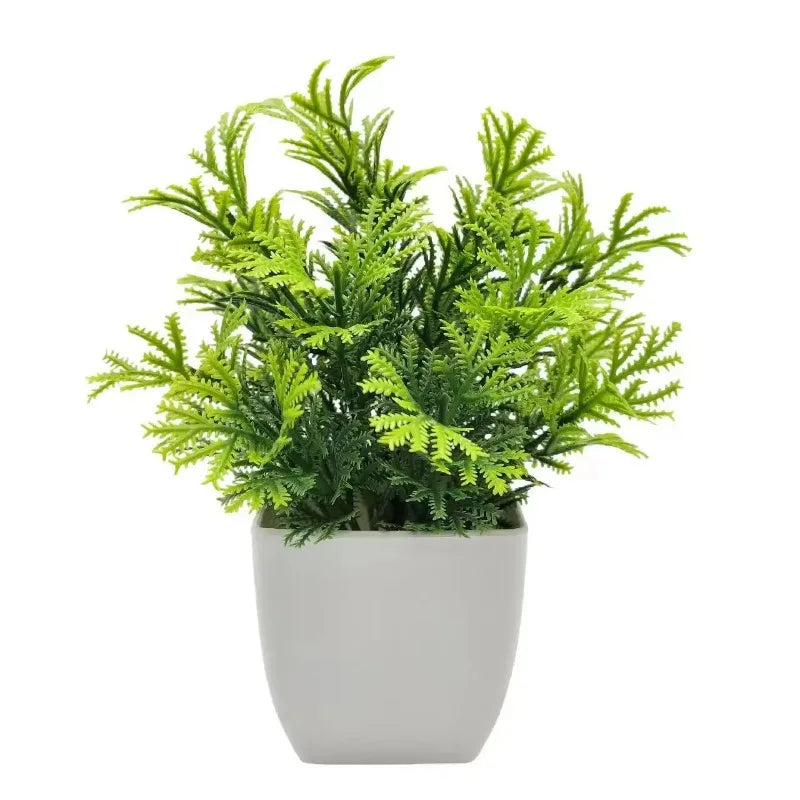 Planta artificial en maceta blanca
