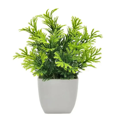 Planta artificial en maceta blanca